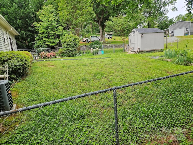 1982 Conley Rd, Morganton, NC 28655 - fenced backyard with a shed and a detached garage