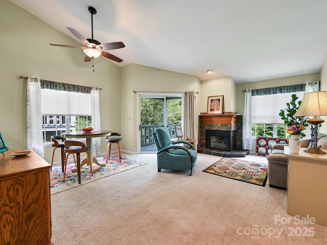 621 E Park Pl, Hendersonville, NC 28791 - living room featuring carpet floors, ceiling fan, a fireplace, and high vaulted ceiling