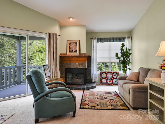 621 E Park Pl, Hendersonville, NC 28791 - carpeted living room with plenty of natural light and a fireplace