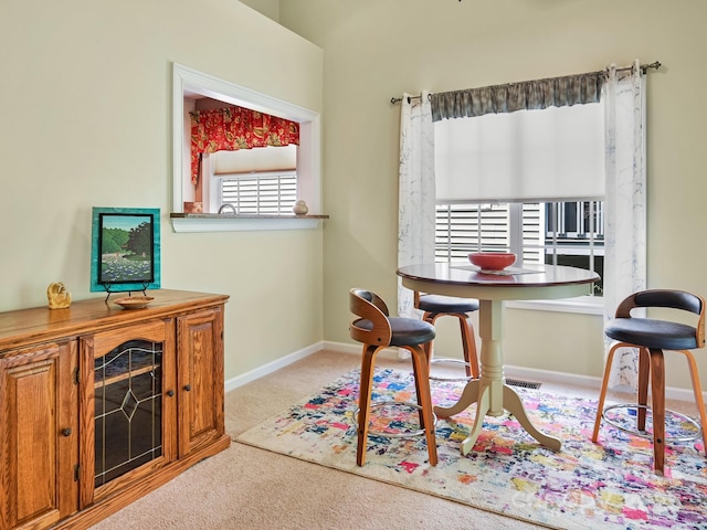 621 E Park Pl, Hendersonville, NC 28791 - dining space with carpet flooring and baseboards