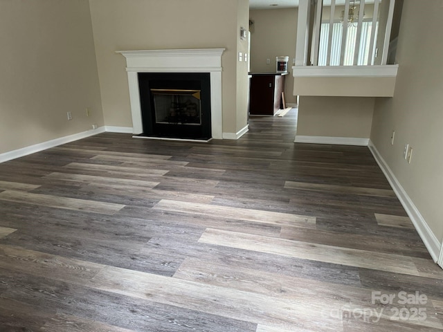 1814 Birch Heights Ct, Charlotte, NC 28213 - unfurnished living room featuring wood finished floors and a fireplace