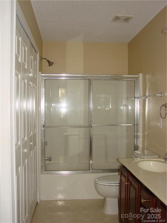 1814 Birch Heights Ct, Charlotte, NC 28213 - bathroom with vanity, tile patterned flooring, and bath / shower combo with glass door