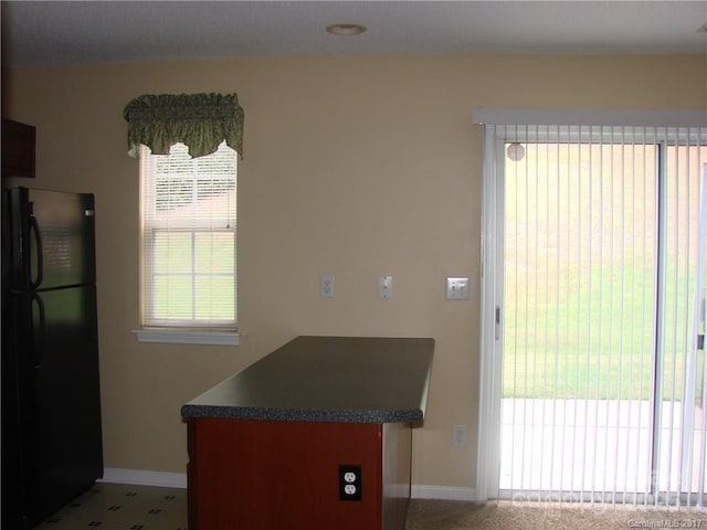1814 Birch Heights Ct, Charlotte, NC 28213 - kitchen with freestanding refrigerator and dark countertops