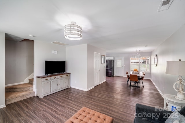 5116 Crane Point Dr, Charlotte, NC 28227 - living area with dark wood finished floors and stairs