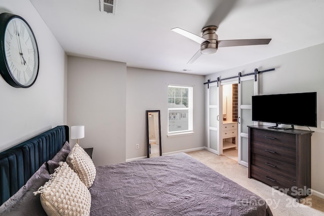 5116 Crane Point Dr, Charlotte, NC 28227 - bedroom with light colored carpet, a barn door, connected bathroom, and ceiling fan