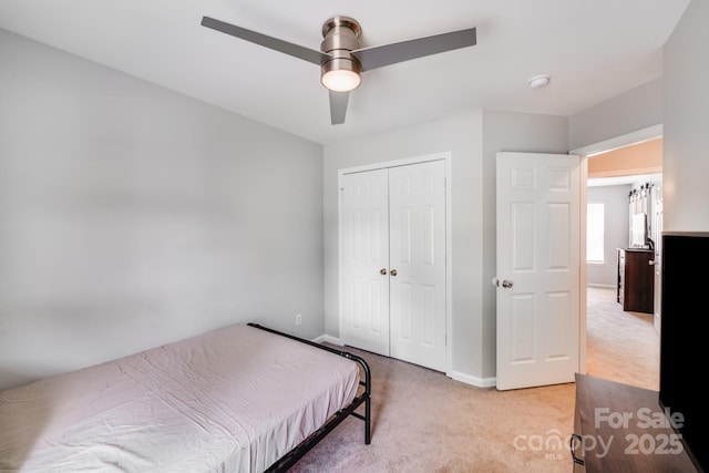 5116 Crane Point Dr, Charlotte, NC 28227 - bedroom featuring light carpet, a closet, and a ceiling fan