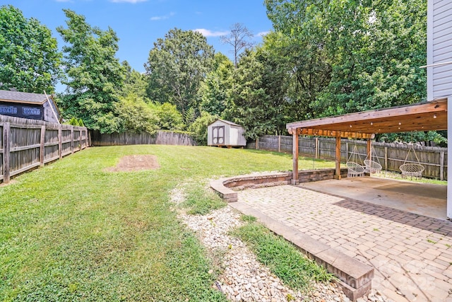 5116 Crane Point Dr, Charlotte, NC 28227 - fenced backyard with a patio and a storage shed