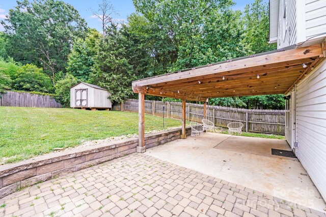 5116 Crane Point Dr, Charlotte, NC 28227 - fenced backyard with a patio area and a shed