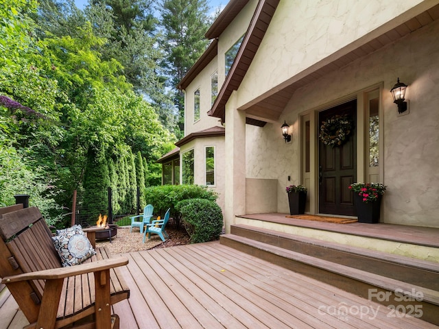 102 Gap Creek Rd, Fletcher, NC 28732 - wooden deck featuring an outdoor fire pit