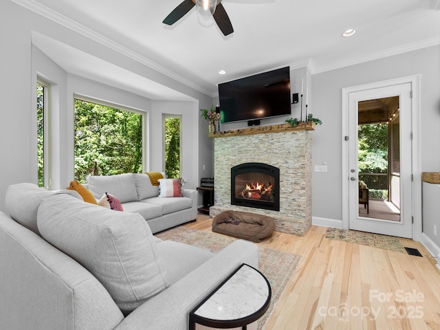 102 Gap Creek Rd, Fletcher, NC 28732 - living room featuring ceiling fan, wood finished floors, crown molding, a fireplace, and recessed lighting