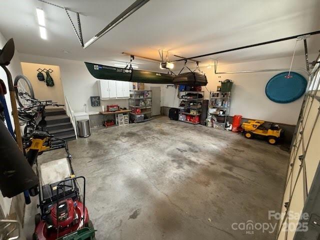 102 Gap Creek Rd, Fletcher, NC 28732 - garage featuring a garage door opener