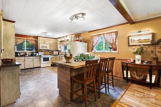 1104 Pump Station Rd, Kannapolis, NC 28081 - kitchen featuring white appliances, healthy amount of natural light, wood counters, and ornamental molding