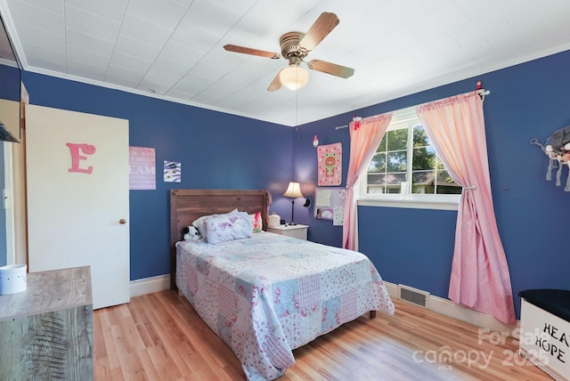 1104 Pump Station Rd, Kannapolis, NC 28081 - bedroom with wood finished floors and a ceiling fan