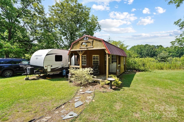 1104 Pump Station Rd, Kannapolis, NC 28081 - view of front of property featuring a gambrel roof and a front lawn