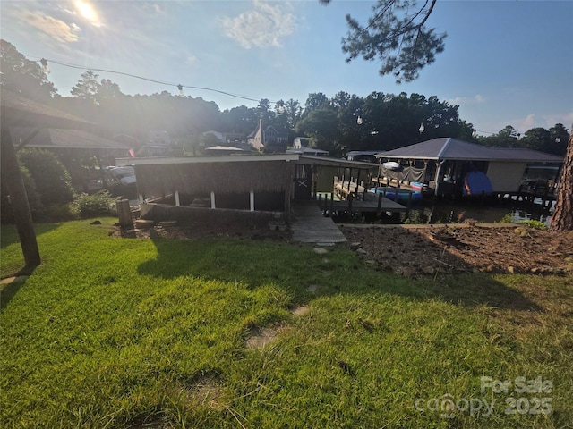 690 Lake Head Rd Unit 132, Norwood, NC 28128 - rear view of property with a lawn and boat lift
