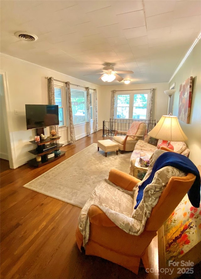 3702 Crawford St, Gastonia, NC 28052 - living room featuring wood finished floors, a ceiling fan, and ornamental molding