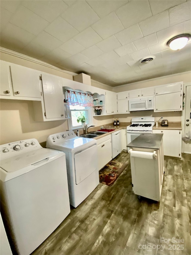 3702 Crawford St, Gastonia, NC 28052 - laundry room featuring washer and clothes dryer and dark wood finished floors
