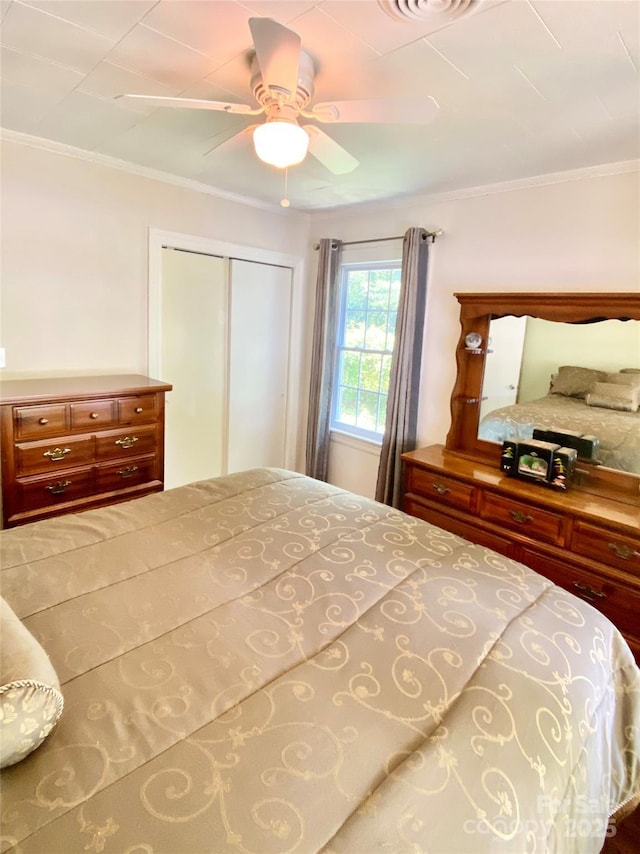 3702 Crawford St, Gastonia, NC 28052 - bedroom featuring a closet, crown molding, and a ceiling fan