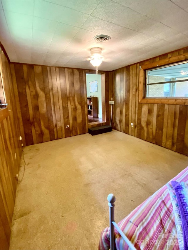 3702 Crawford St, Gastonia, NC 28052 - spare room featuring wood walls and carpet