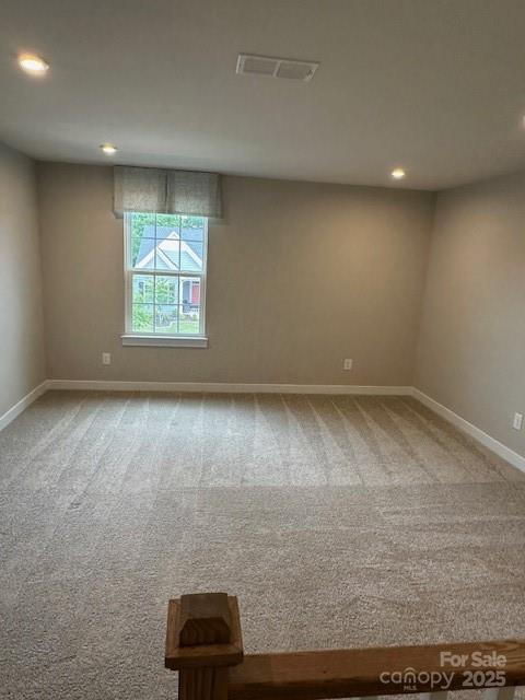 1411 Cottage Green Dr Unit 218, Monroe, NC 28112 - carpeted spare room with recessed lighting