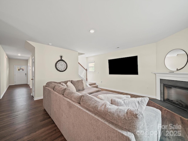 404 Saddlebred Ln, Locust, NC 28097 - living area featuring stairway, dark wood-type flooring, recessed lighting, and a glass covered fireplace