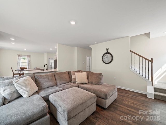 404 Saddlebred Ln, Locust, NC 28097 - living room with dark wood-type flooring, stairs, and recessed lighting