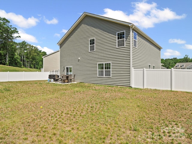 404 Saddlebred Ln, Locust, NC 28097 - view of property exterior featuring a fenced backyard and a patio