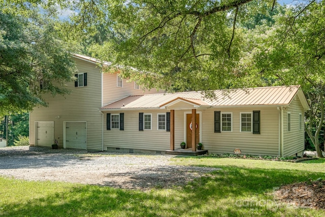 4919 Rehobeth Rd, Waxhaw, NC 28173 - view of front of home with crawl space, gravel driveway, a metal roof, a garage, and a front yard