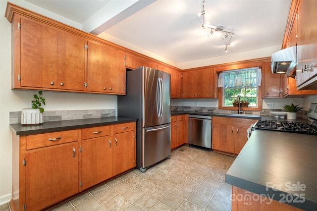 4919 Rehobeth Rd, Waxhaw, NC 28173 - kitchen featuring stainless steel appliances, brown cabinetry, and dark countertops