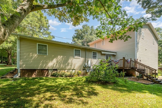4919 Rehobeth Rd, Waxhaw, NC 28173 - back of house with stairway, a lawn, and a wooden deck