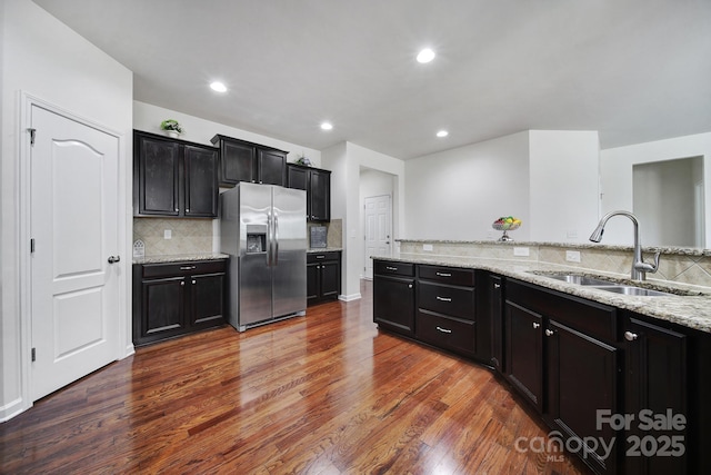248 Catoctin Rd, Rock Hill, SC 29732 - kitchen featuring stainless steel fridge with ice dispenser, wood finished floors, backsplash, and recessed lighting