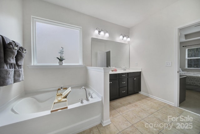 248 Catoctin Rd, Rock Hill, SC 29732 - full bathroom featuring double vanity, a garden tub, tile patterned floors, and plenty of natural light