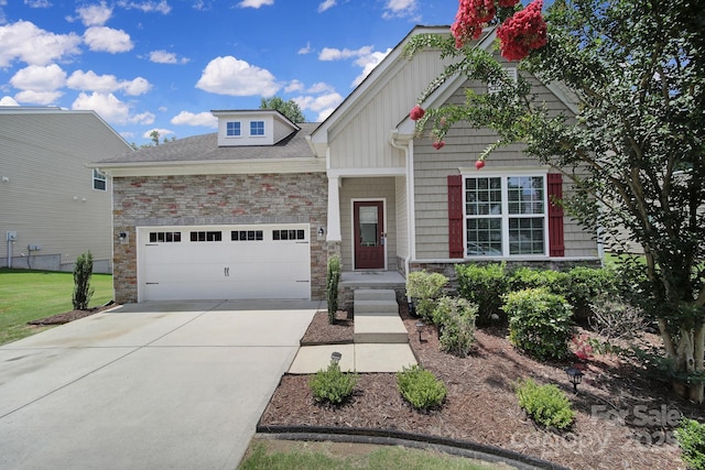 248 Catoctin Rd, Rock Hill, SC 29732 - craftsman-style house with stone siding, an attached garage, and driveway