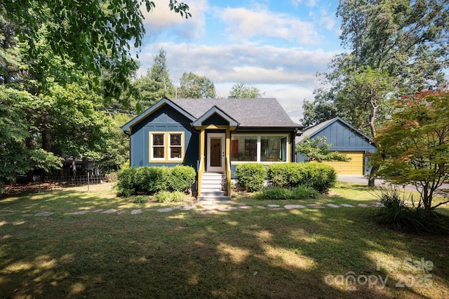 136 Graveyard Rd, Fairview, NC 28730 - bungalow-style home featuring a detached garage and board and batten siding