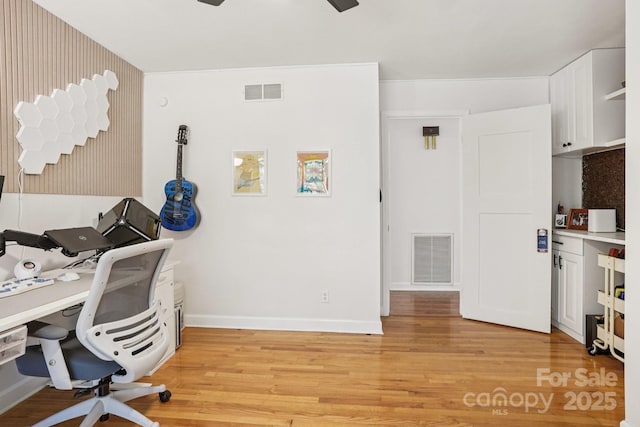 7107 Cedarfield Rd, Charlotte, NC 28227 - office area with light wood finished floors and ceiling fan