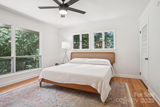 7107 Cedarfield Rd, Charlotte, NC 28227 - bedroom with wood finished floors and ceiling fan