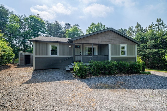 2420 Timberland Hills Dr, Newton, NC 28658 - view of front facade with covered porch and gravel driveway