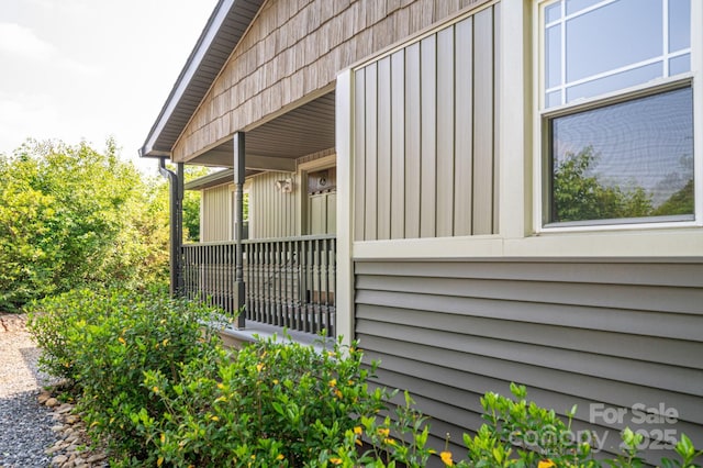 2420 Timberland Hills Dr, Newton, NC 28658 - view of side of home featuring board and batten siding
