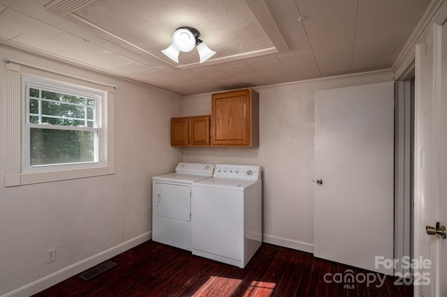 2420 Timberland Hills Dr, Newton, NC 28658 - washroom featuring washing machine and dryer, cabinet space, dark wood-style flooring, and ornamental molding