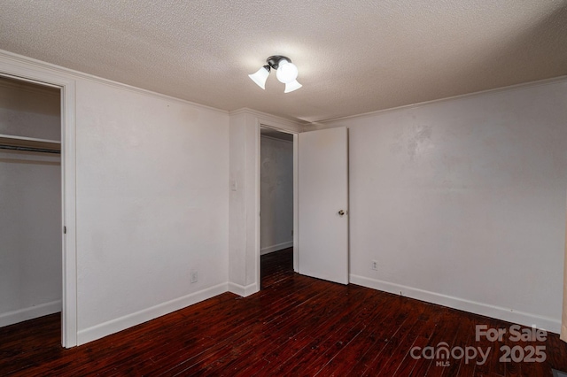2420 Timberland Hills Dr, Newton, NC 28658 - unfurnished bedroom featuring wood-type flooring, a textured ceiling, and ornamental molding