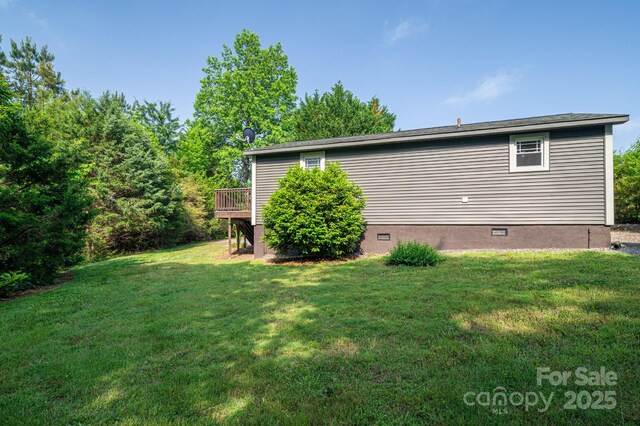 2420 Timberland Hills Dr, Newton, NC 28658 - rear view of property featuring crawl space, a yard, and a wooden deck