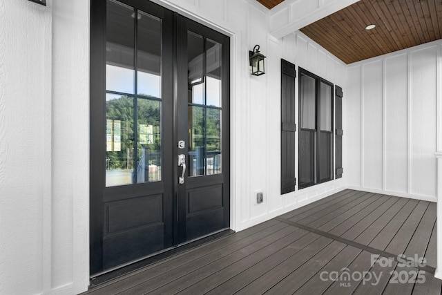3981 Zero Mull Rd, Morganton, NC 28655 - property entrance with french doors and board and batten siding