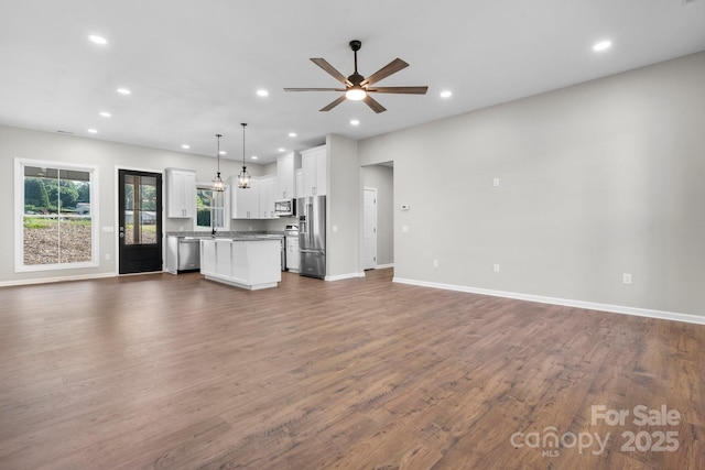 3981 Zero Mull Rd, Morganton, NC 28655 - unfurnished living room with recessed lighting, ceiling fan, and dark wood-style floors