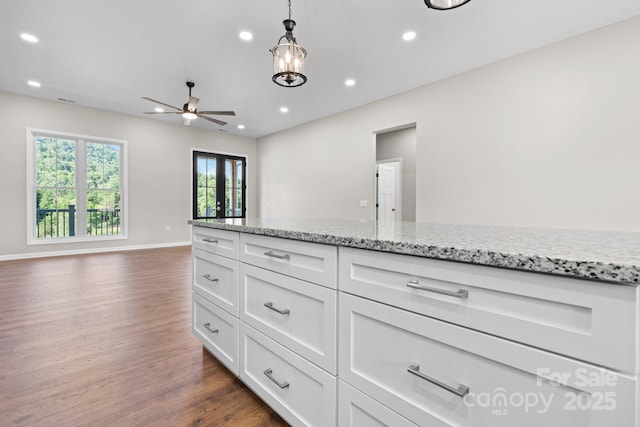3981 Zero Mull Rd, Morganton, NC 28655 - kitchen featuring dark wood-style floors, ceiling fan, open floor plan, white cabinets, and recessed lighting
