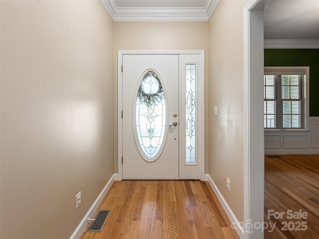 19 Driftstone Cir, Arden, NC 28704 - foyer entrance featuring light wood finished floors and crown molding