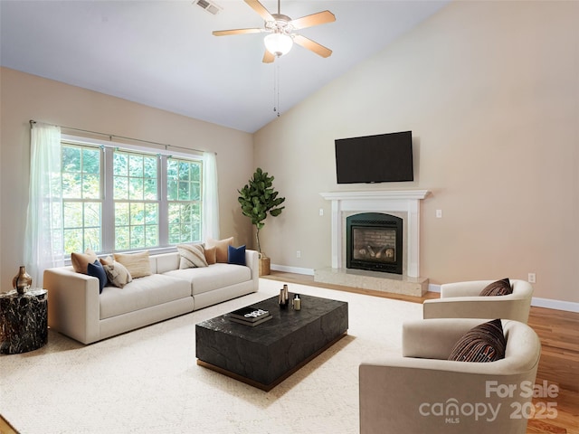 19 Driftstone Cir, Arden, NC 28704 - living area with ceiling fan, a fireplace, wood finished floors, and high vaulted ceiling