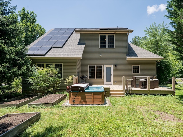 19 Driftstone Cir, Arden, NC 28704 - back of house with a yard, a garden, a wooden deck, and a shingled roof