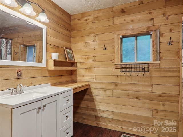 32 Saunooke Rd, Asheville, NC 28805 - full bath with wood walls, vanity, a textured ceiling, and wood finished floors