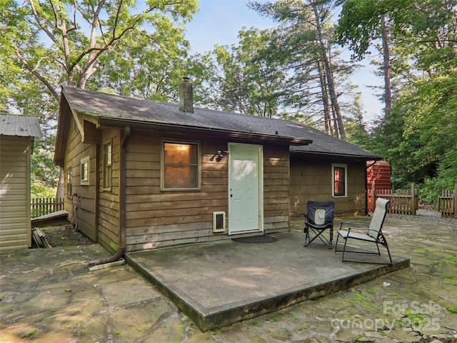 32 Saunooke Rd, Asheville, NC 28805 - back of property featuring a patio and a chimney