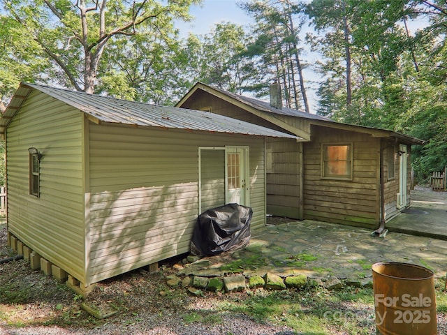 32 Saunooke Rd, Asheville, NC 28805 - view of side of property with a patio and a metal roof